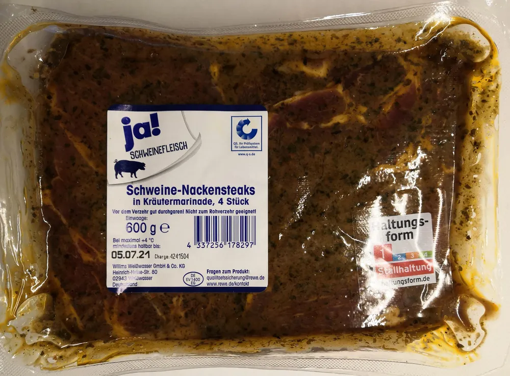 Schweine-Nackensteaks in Kräuterbuttermarinade