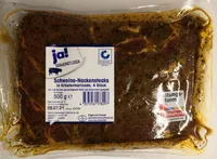Schweine-Nackensteaks in Kräuterbuttermarinade