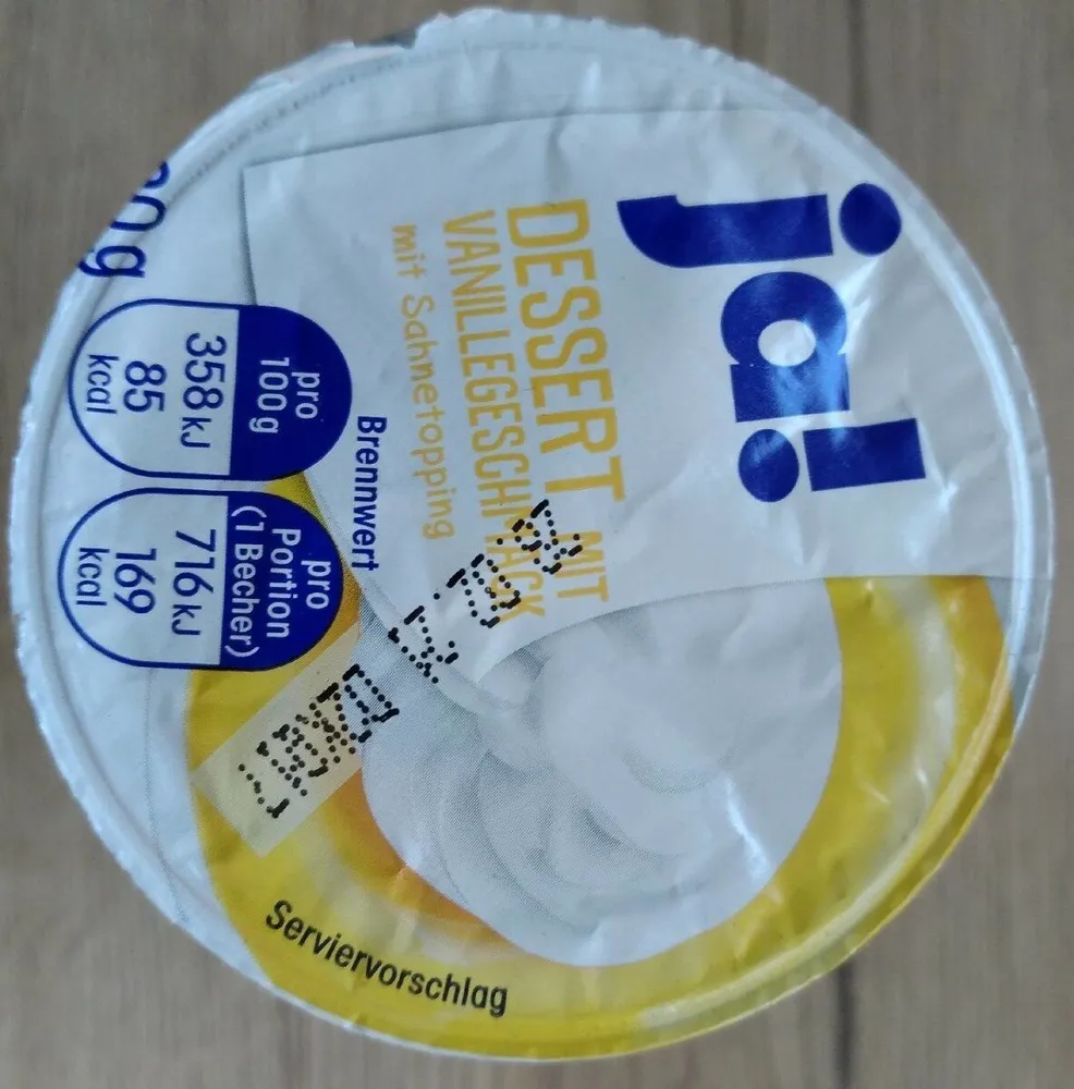 Dessert mit Vanillegeschmack mit Sahnetopping