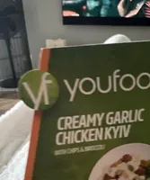 Creamy garlic chicken Kyiv with chips & broccoli