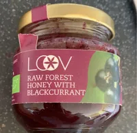 Raw forest honey with blackcurrant