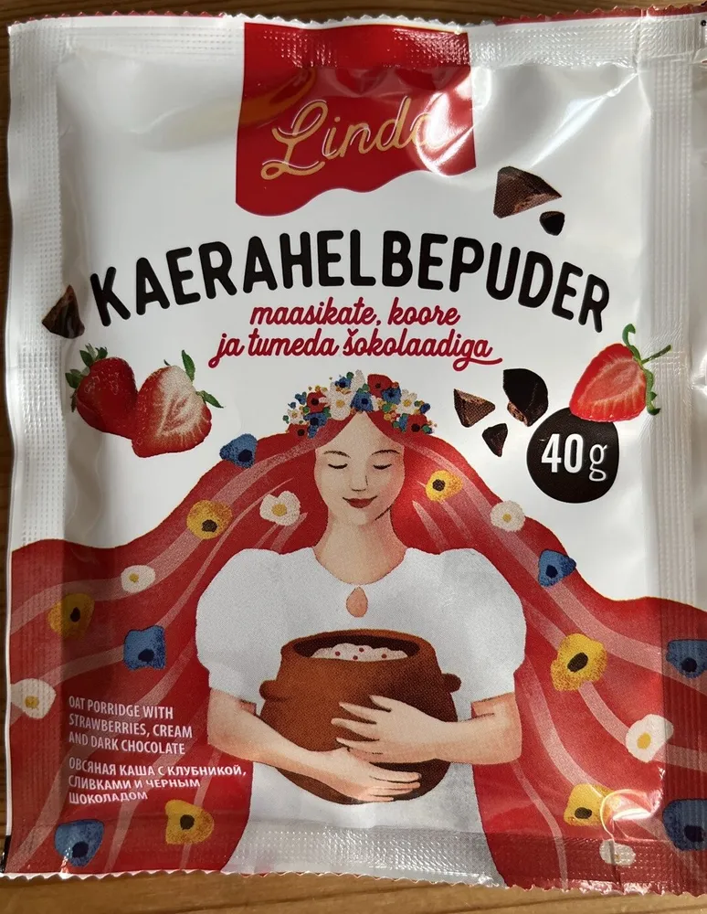 Kaerahelbepuder maasikate koore ja tumeda šokolaadiga