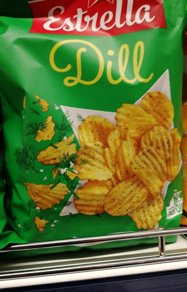 Crinkle cut potato chips with the taste of dill