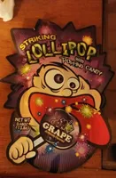 Striking lolipop with popping candy