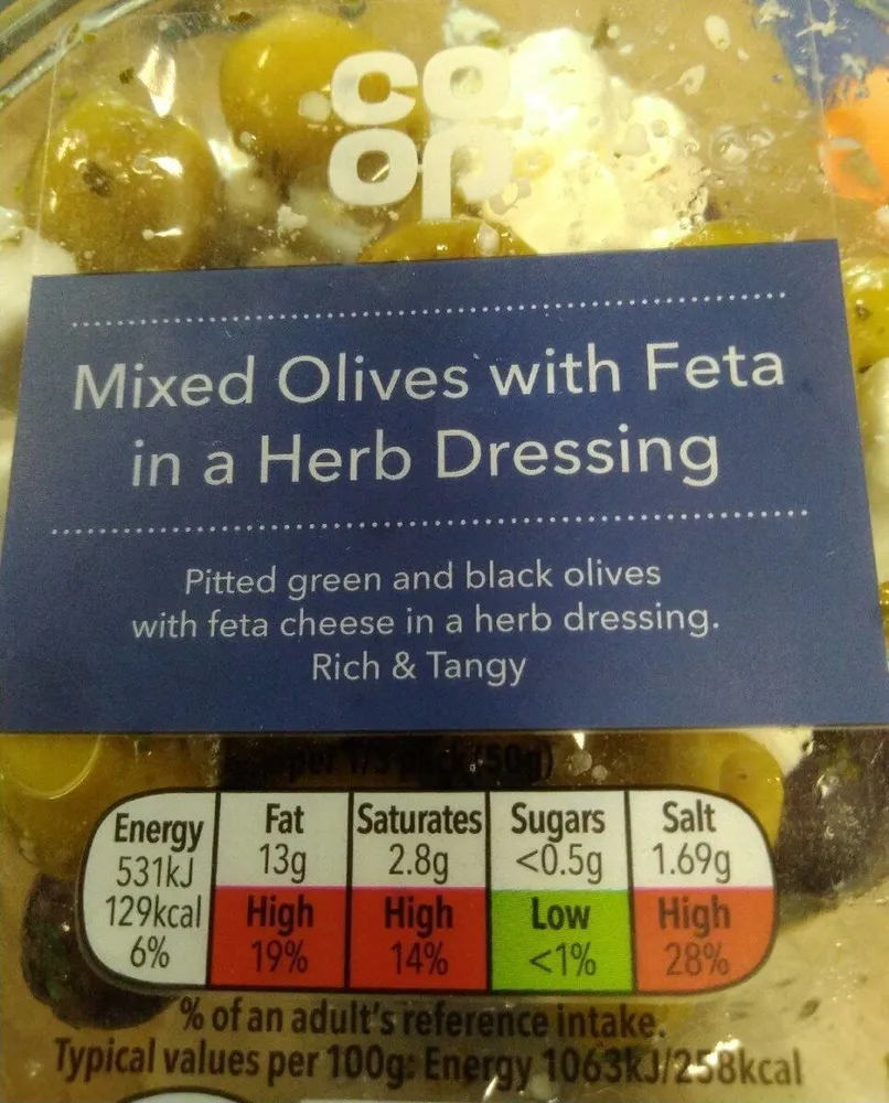 Mixed olives with feta in a herb dressing