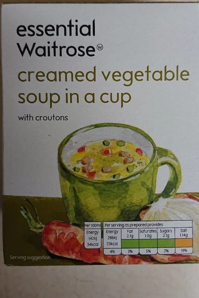 Creamed vegetable soup in a cup with croutons