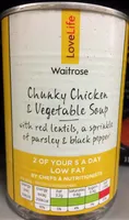 Chunky chicken and vegetable soup with red lentils, a sprinkle of parsley & black pepper