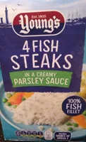4 fish steaks in a creamy parsley sauce