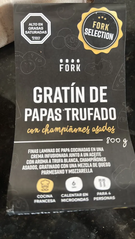 Gratín de papas trufado con champiñones asados