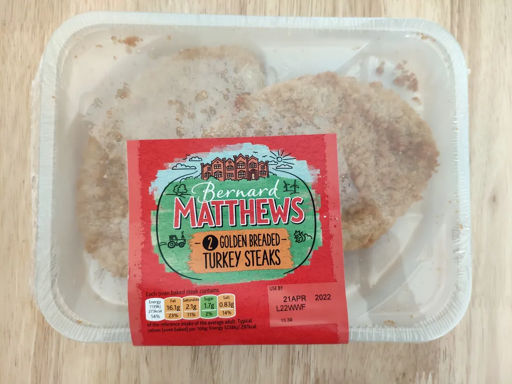 Golden breaded turkey steaks
