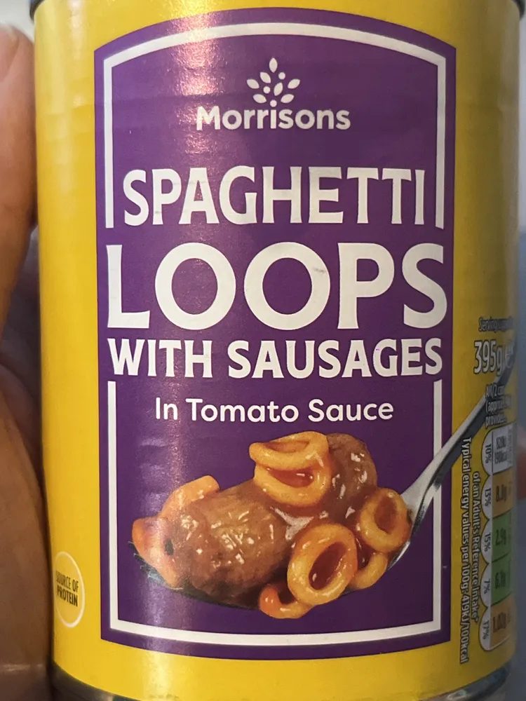 Spaghetti loops with sausages and tomato sauce