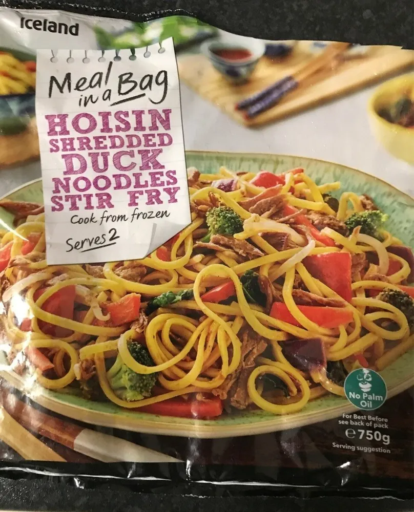 Hoisting shredded duck noodles stirfry