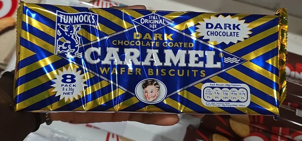 Dark chocolate coated caramel wafer biscuits