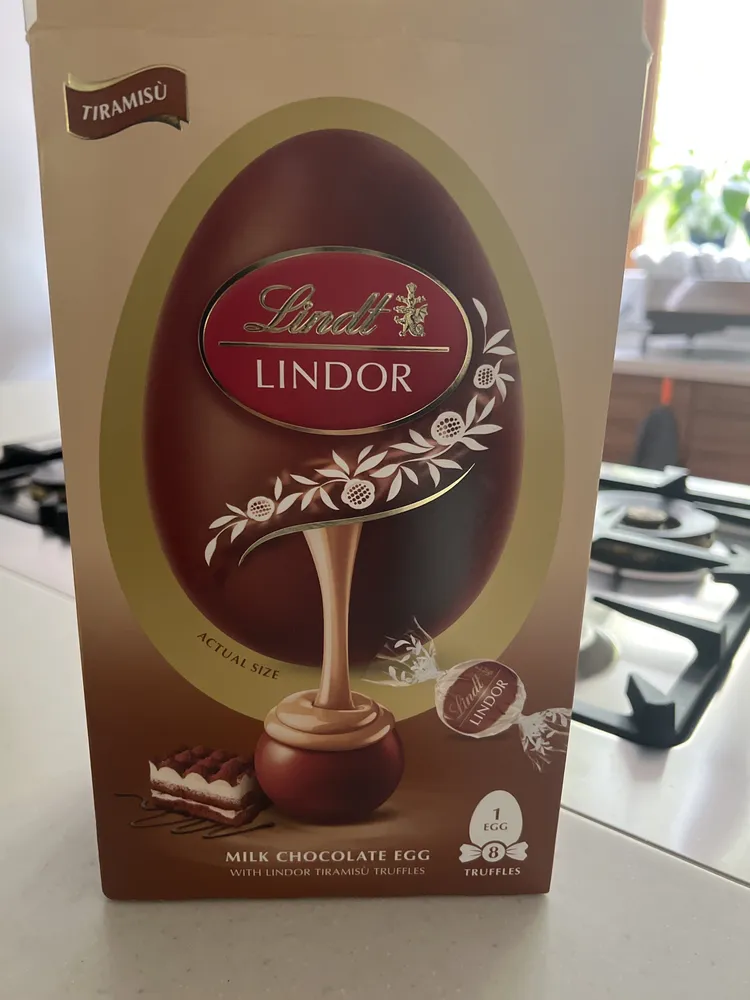 Milk chocolate egg with lindor tiramisu truffles