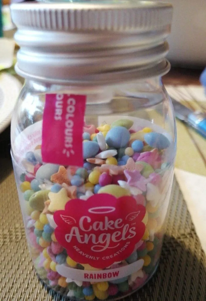 A mix of milk chocolate and multi-colored sugar sprinkles
