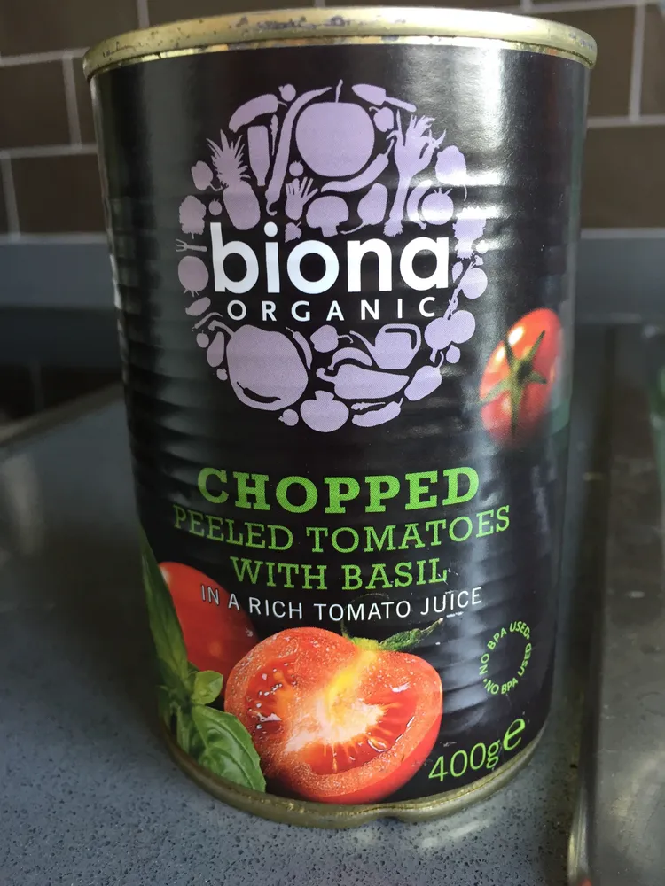Chopped peeled tomatoes with basil