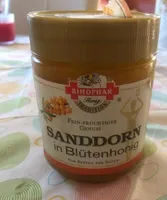 Sandkorn in Blütenhonig