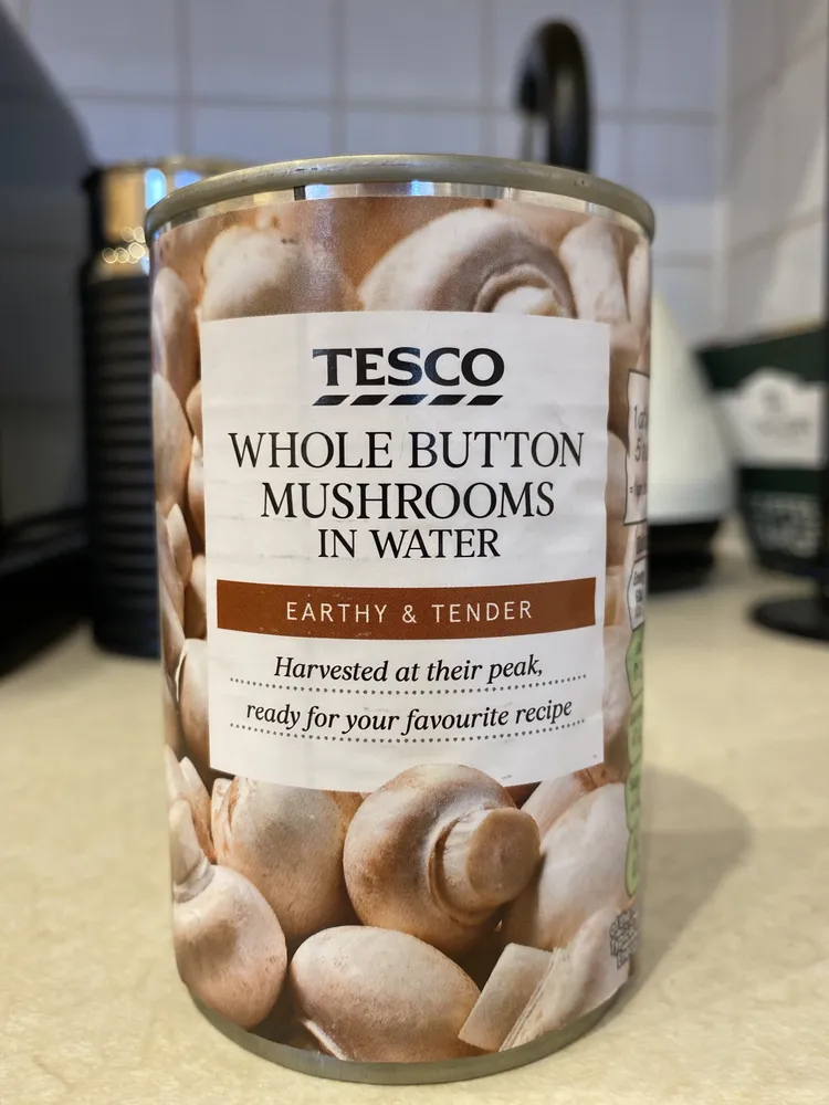 whole button mushrooms in water