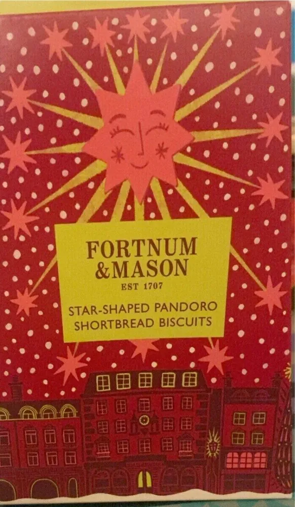 Star-shaped pandoro shortbread biscuits