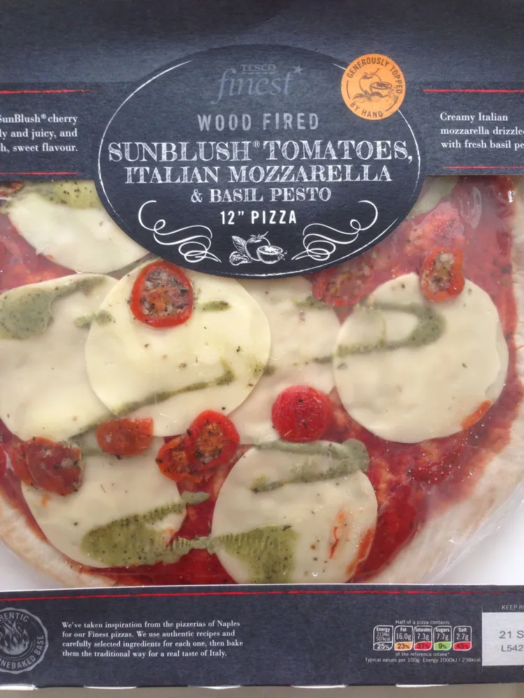 wood fired sunblush tomatoes, italian mozzarella & basil pesto 12'' pizza