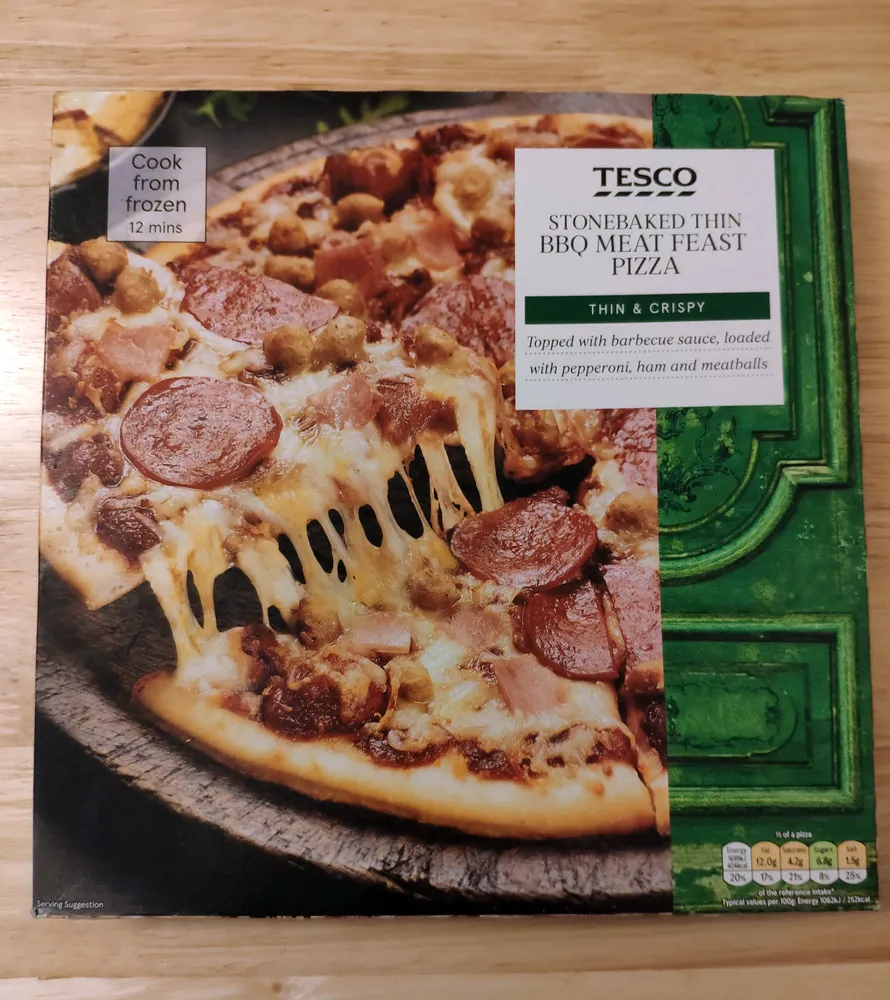 Stonebaked thin BBQ meat feast pizza