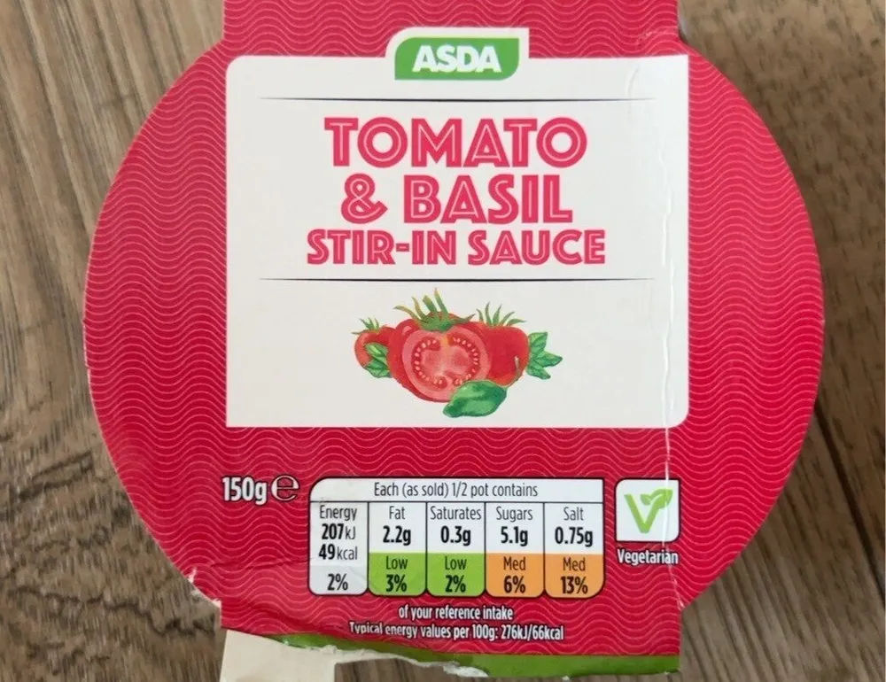Tomato and basil stir in pasta sauce