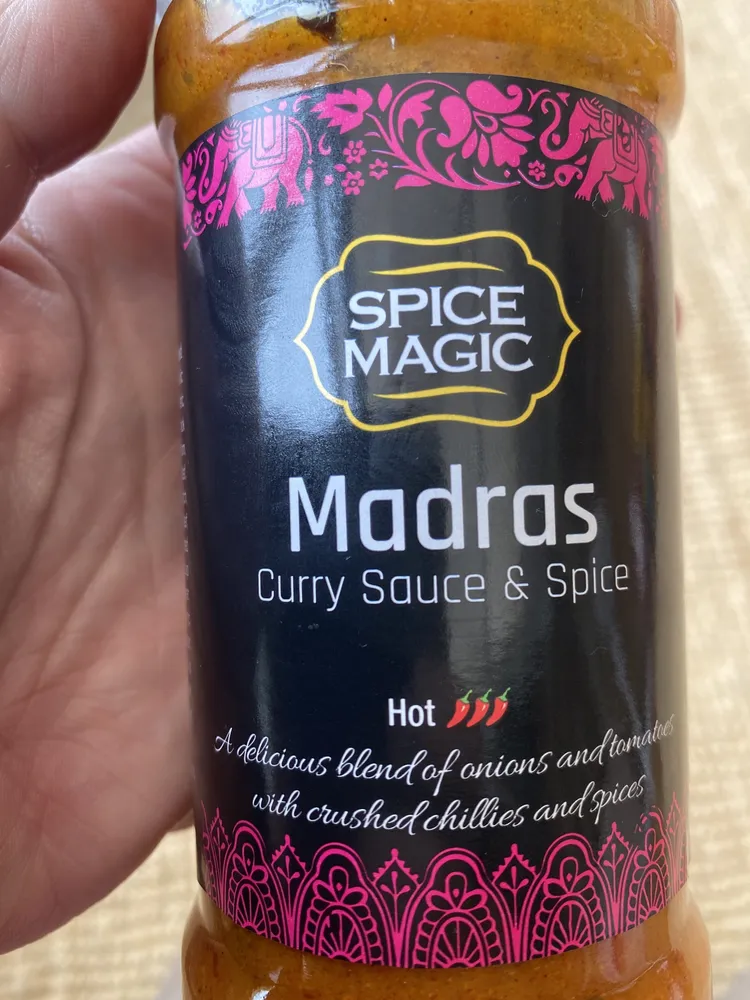 Madras curry sauce and spice pot