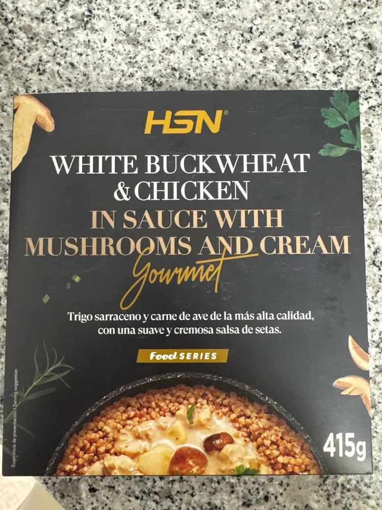 White buckwheat & chicken in sauce with mushrooms and cream