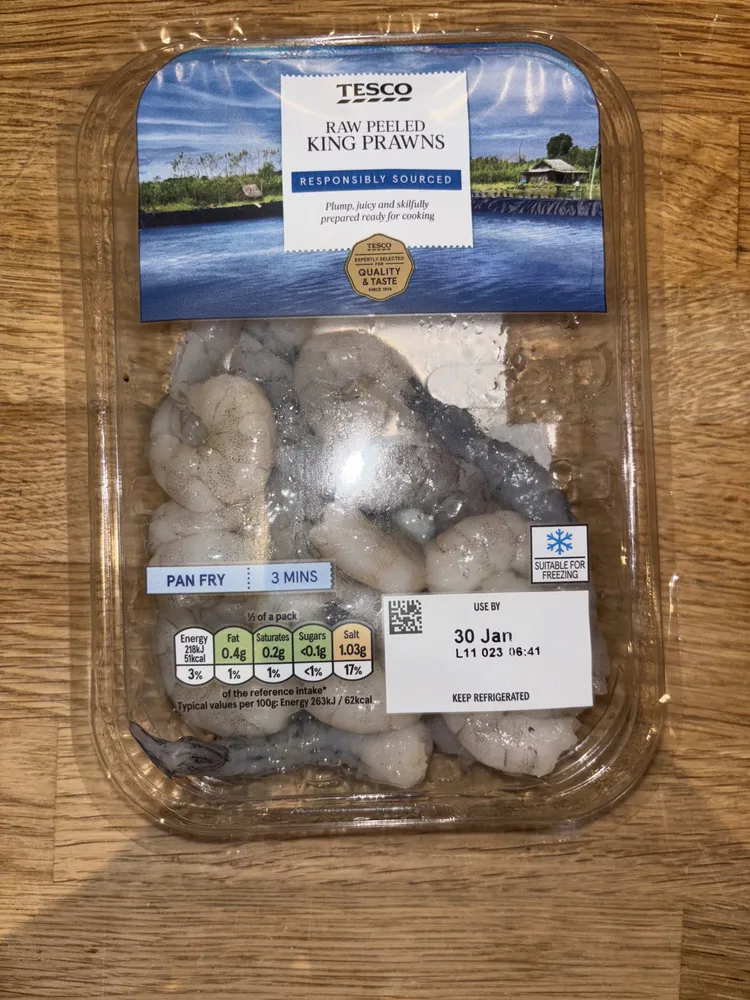 Raw peeled king prawns
