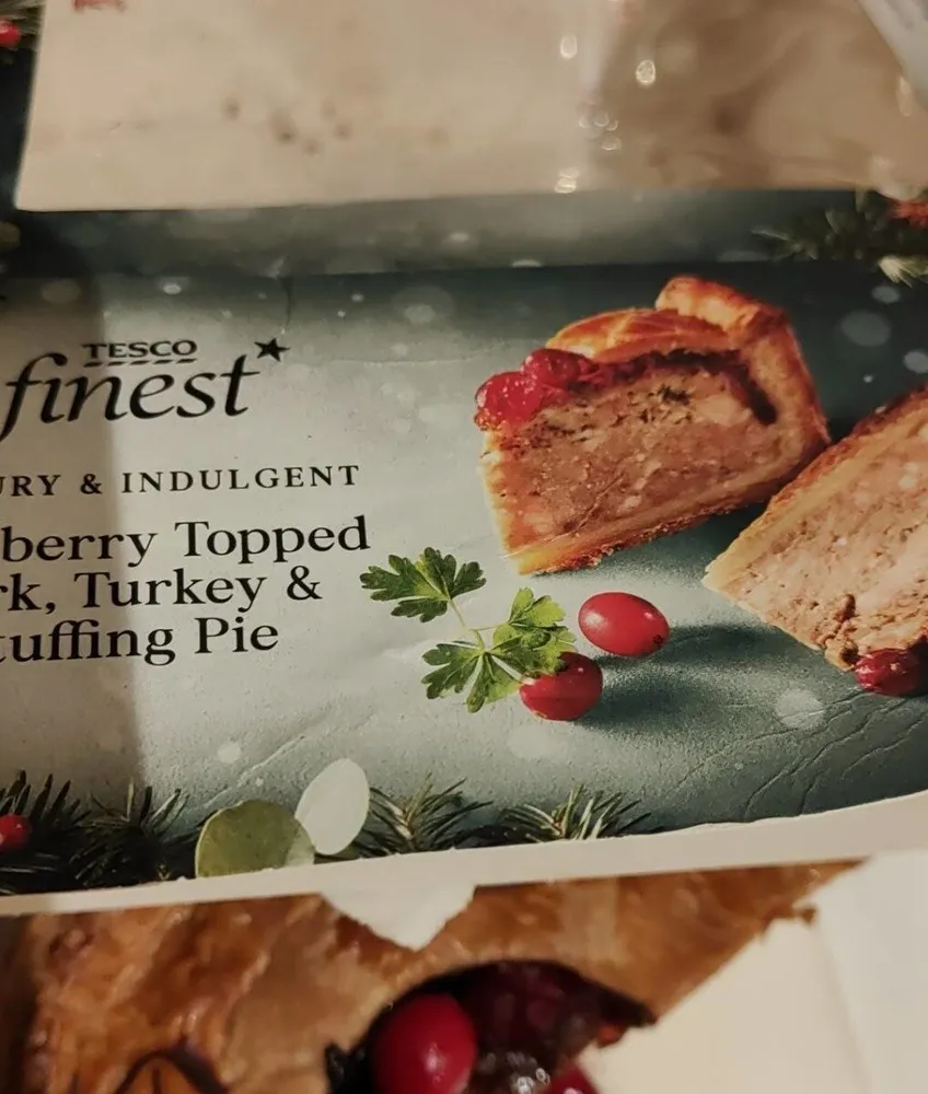 Cranberry topped pork, turkey and stuffing pie
