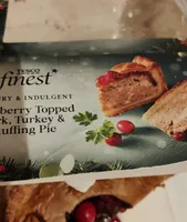 Cranberry topped pork, turkey and stuffing pie