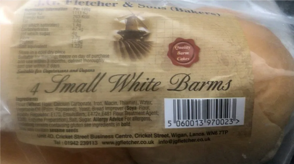 4 small white barns