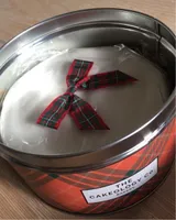 Fruit cake with brandy, topped with marzipan and soft icing