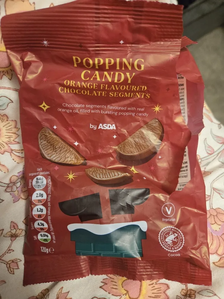 contains: POPPING CANDY ORANGE FLAVOURED CHOCOLATE