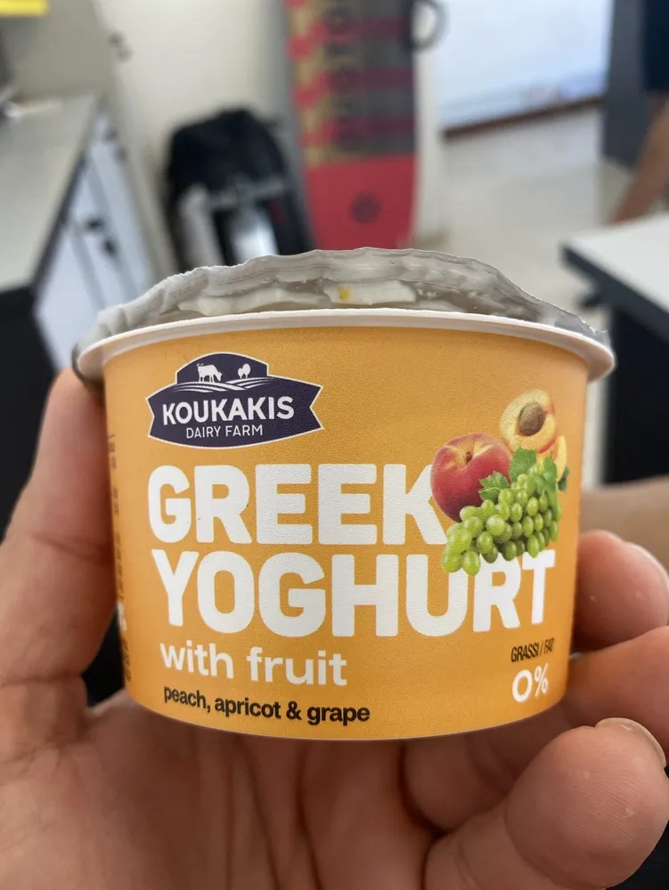 Greek yoghurt with fruit peach, apricot and grape