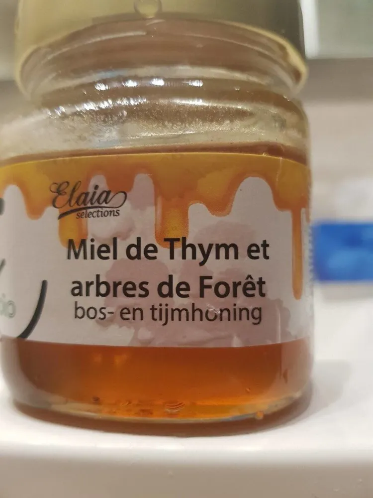 Miel de thym et arbres de Forêt