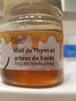 Miel de thym et arbres de Forêt