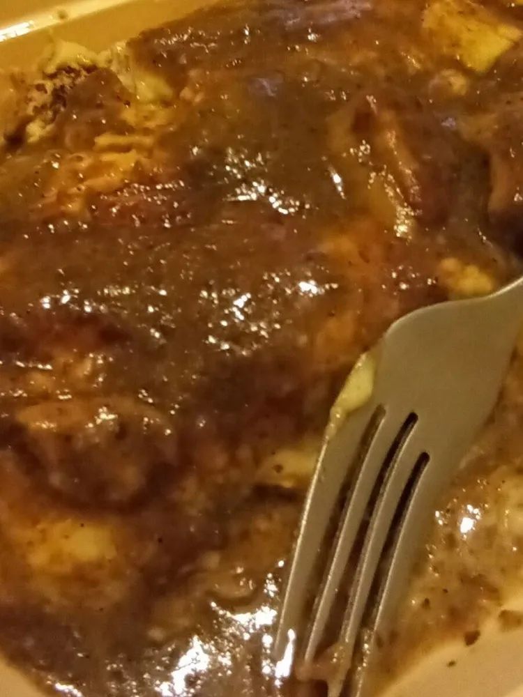 Canelon de collar de cordero y salsa de boletus