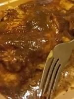 Canelon de collar de cordero y salsa de boletus