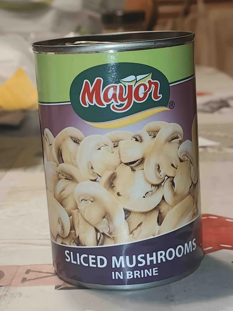 Sliced mushrooms in brine (drained)