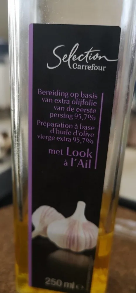Préparation à base d'huile d'olive vierge extra aromatisée Saveur Ail