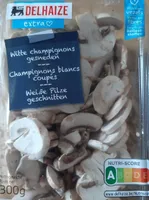 Witte champignons gesneden