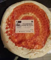 Fond de pizza cuit sur pierre à la sauce tomate