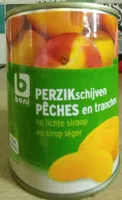 Pêches en tranches au sirop