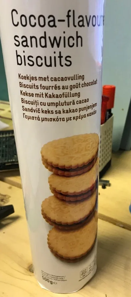 Cocoa flavour sandwich biscuits