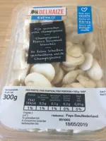 Champignons blancs finement tranchés