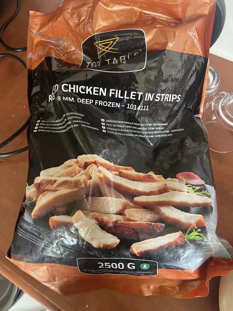 Roasted chicken fillet in strips