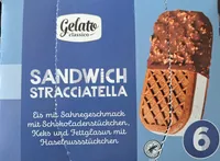 Eis mit Sahnegeschmack mit Schokoladenstückchen, kakaohaltigem Keks und kakaohaltiger Fettglasur mit Haselnussstückchen