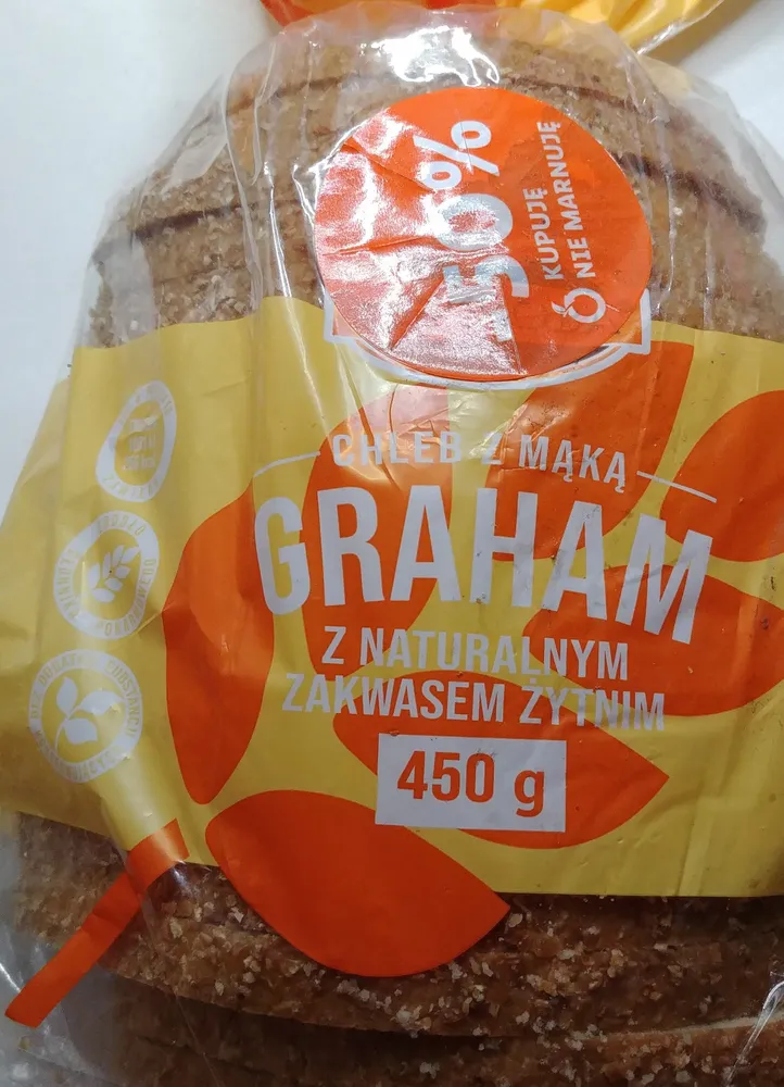 Chleb-pszenno-żytni z mąką pełnoziarnistą graham oraz dodatkiem zakwasu żytniego, krojony.
