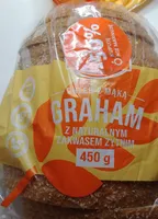 Chleb-pszenno-żytni z mąką pełnoziarnistą graham oraz dodatkiem zakwasu żytniego, krojony.